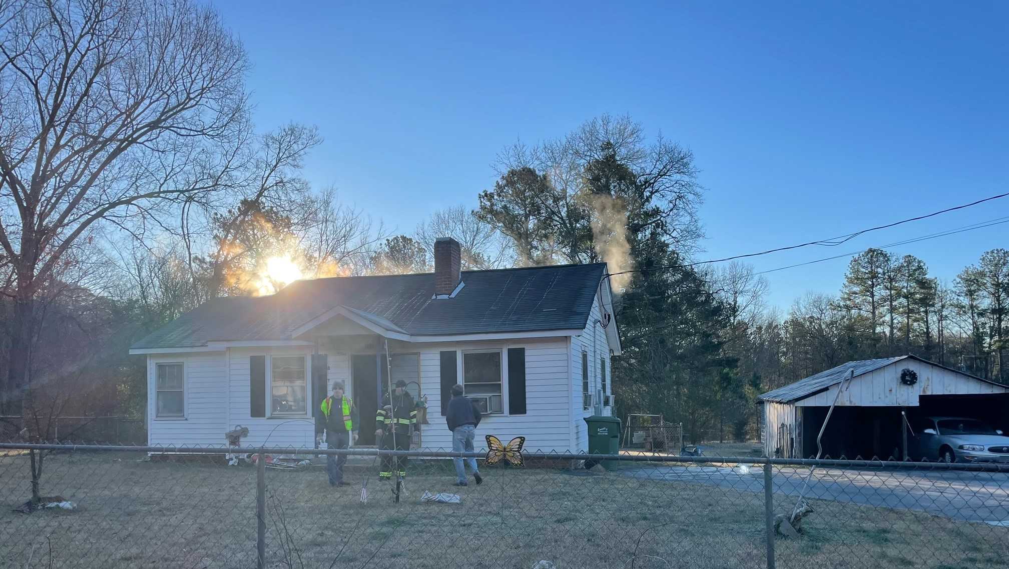 Fire crews rescue woman, dog from Christmas morning house fire, officials say – WYFF4 Greenville